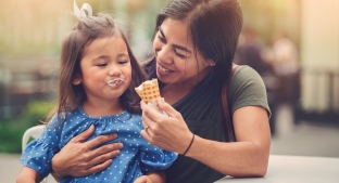 mom eating ice cream with child mom eating ice cream with child