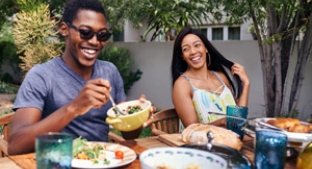 Couple eating healthily outdoors Couple eating healthily outdoors